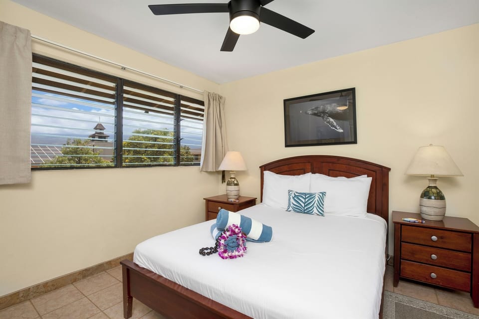 First unit. Have a restful night's sleep in your 2nd bedroom with a queen-size bed.