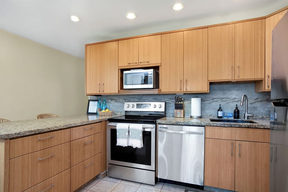First unit. Fully equipped kitchen with full-size appliances.