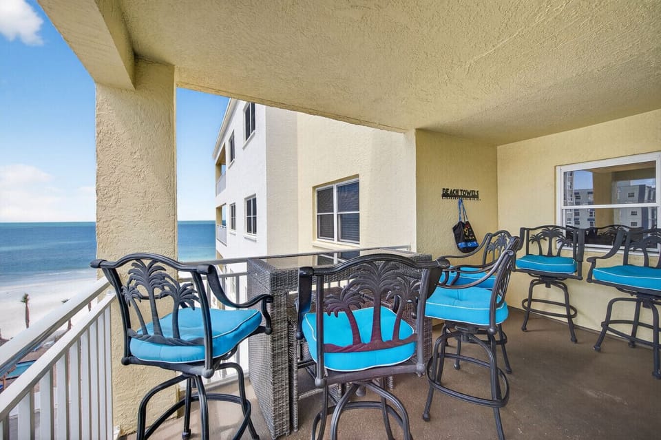 Relax on the spacious balcony w/ comfy seating & a dining table, perfect for enjoying fresh air & water views.