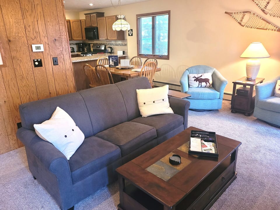 LIVING ROOM:  The large and beautiful living room with walk-out to the bonfire ring.  (Note that the fireplace is not available for guest usage.)