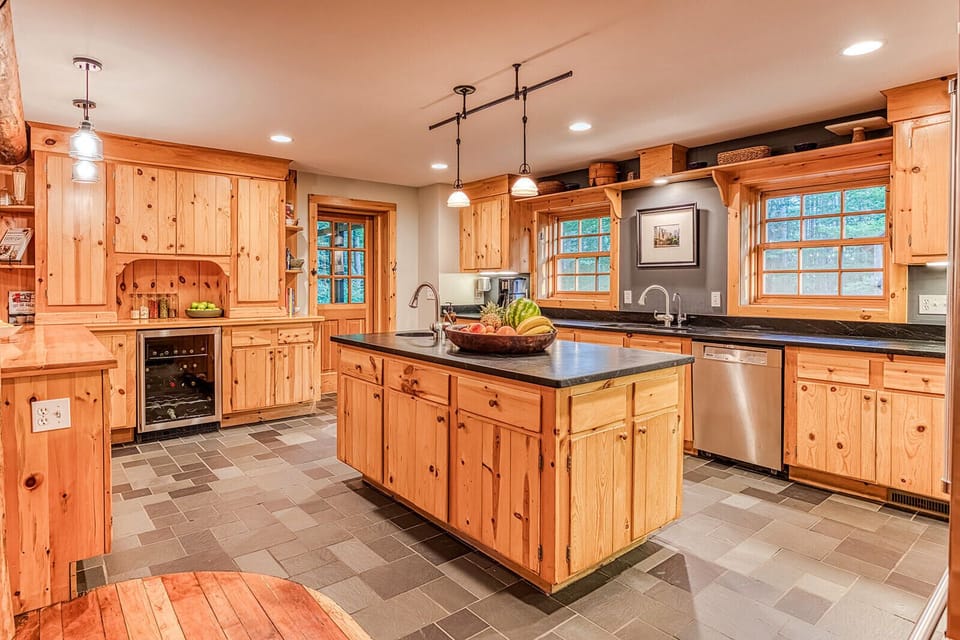 The spacious kitchen is filled with everything needed to prepare a meal at home
