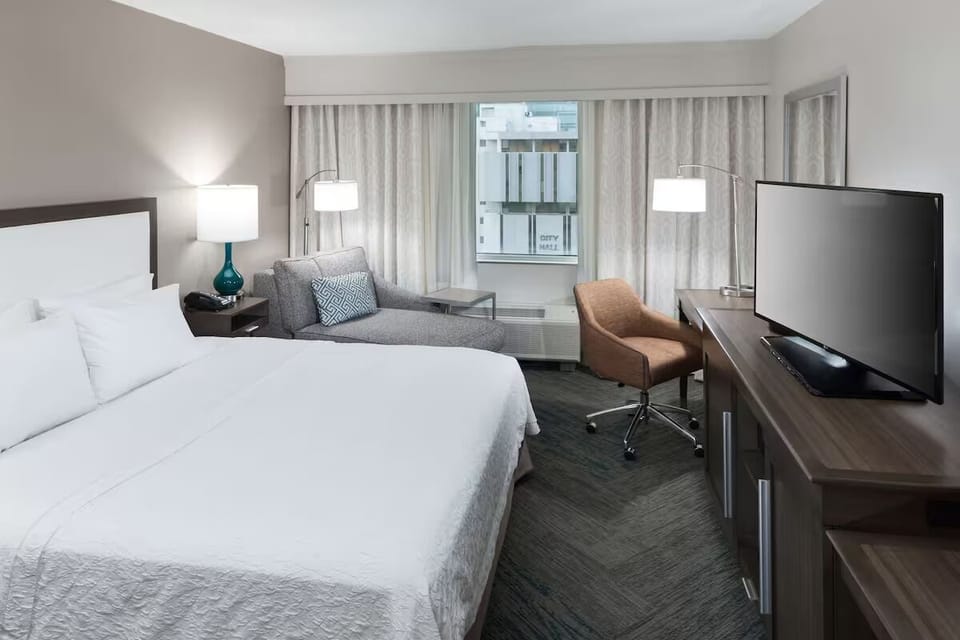 Sink into crisp linens after a day in the city.
