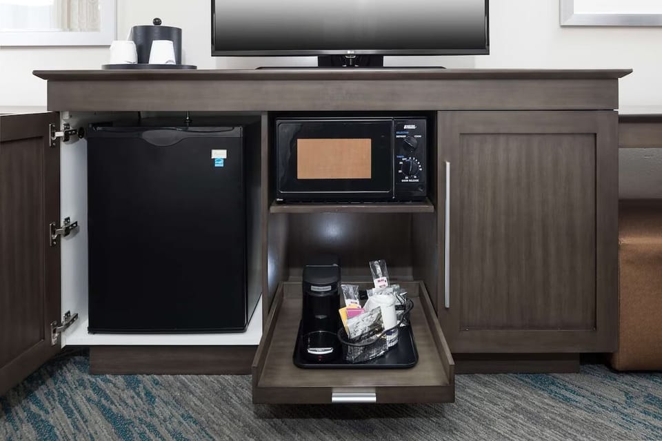 Start your morning with in-room coffee, fridge, and microwave.