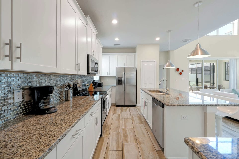 Spacious kitchen with granite counters