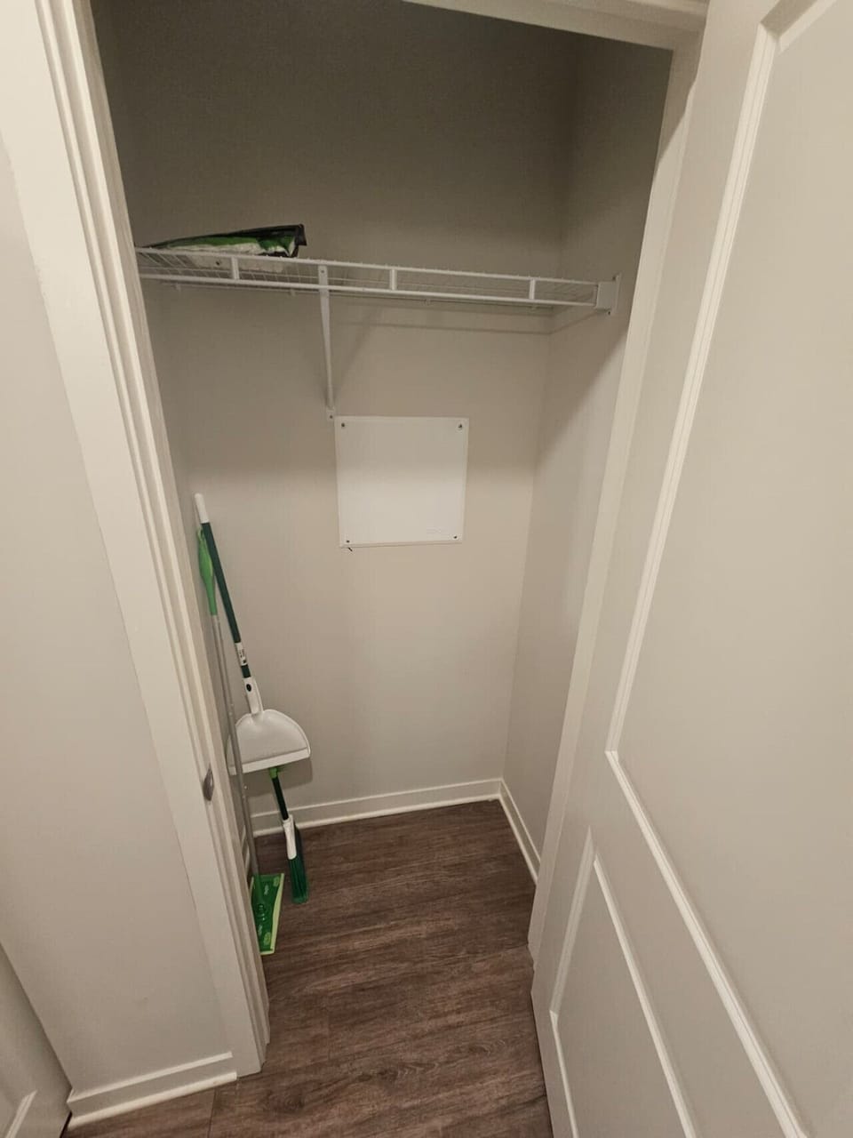 Practical storage space with cleaning essentials, ideal for long stays.