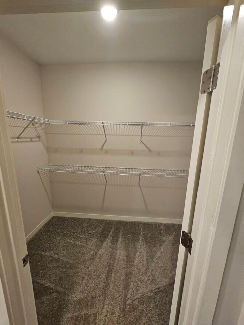 Large walk-in closet offering plenty of space to unpack and feel at home during your stay.