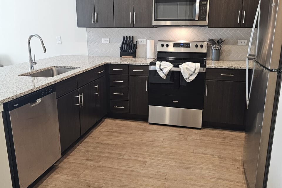 Bright and modern kitchen designed with convenience and comfort in mind.