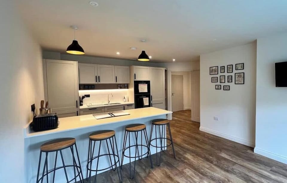 Open plan, Kitchen and Living area. Breakfast bar and smart TV.