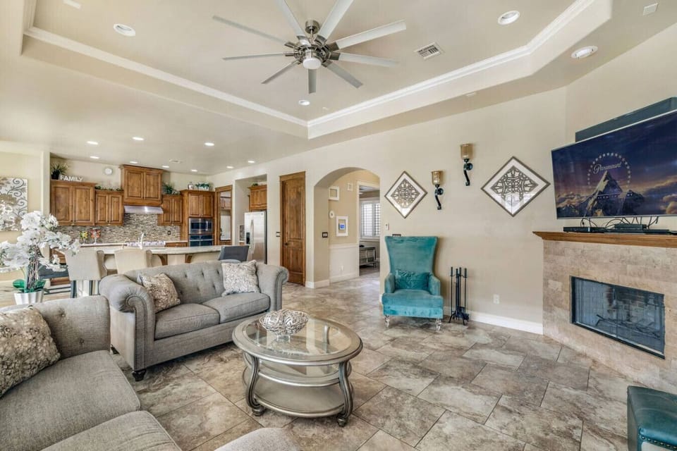 Relax and unwind in our cozy living room, featuring comfortable seating and a warm ambiance.