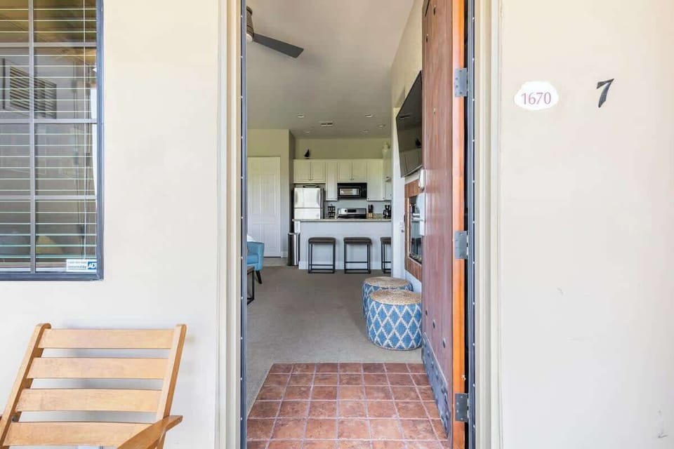 Welcoming entryway with seating area and natural light