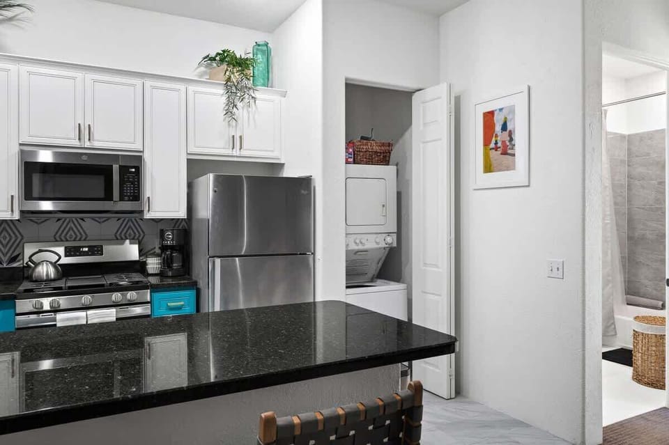 Fully equipped kitchen with sleek stainless steel appliances