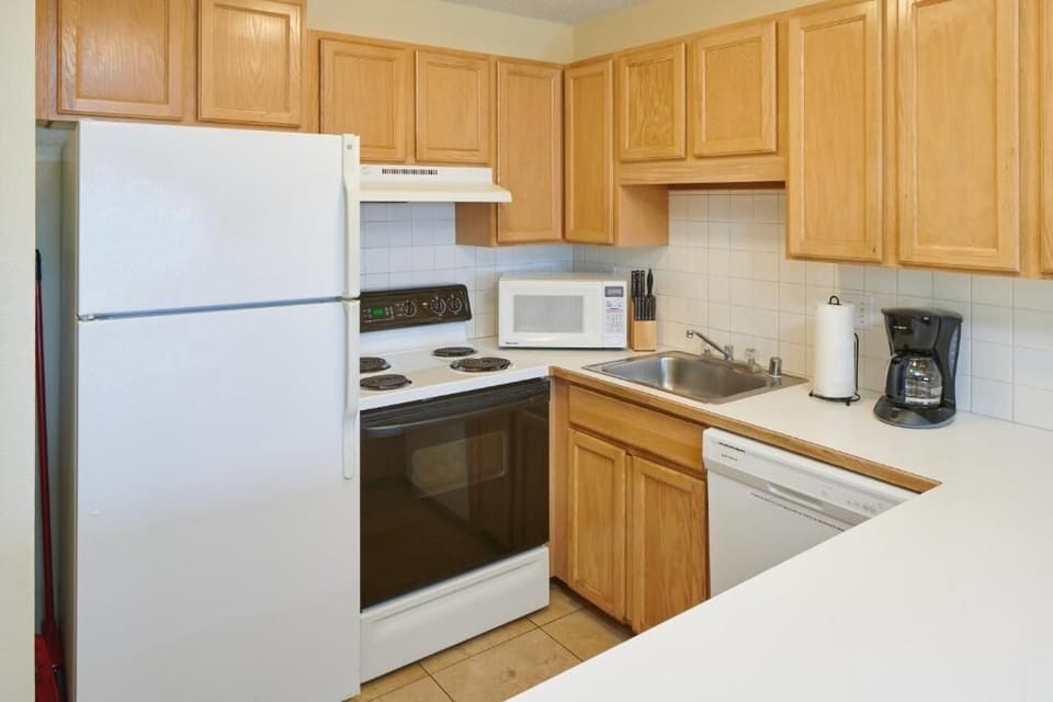 Cook easy meals in a practical kitchen with full appliances.