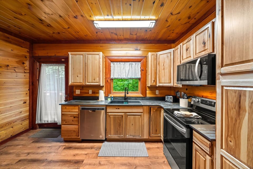 Complete with modern appliances and plenty of prep space, then enjoy meals together at the spacious dining table just steps away.