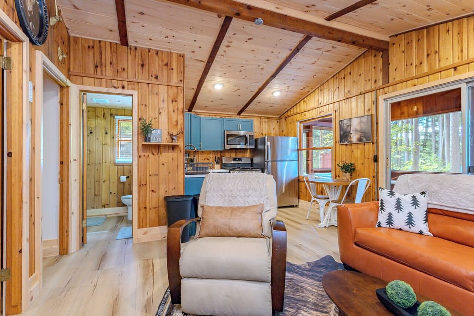 Indulge in comfort and style in our living room, featuring plush sofas, and elegant chairs. Cozy up by the fireplace, and unwind with entertainment on the TV.