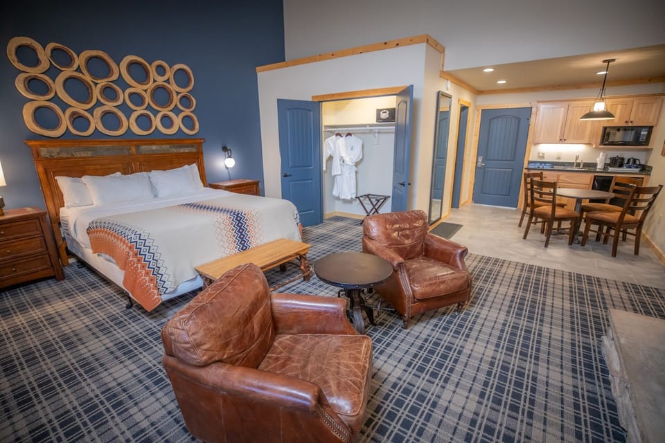 Settle into an expansive suite with sleeping and dining comfort.