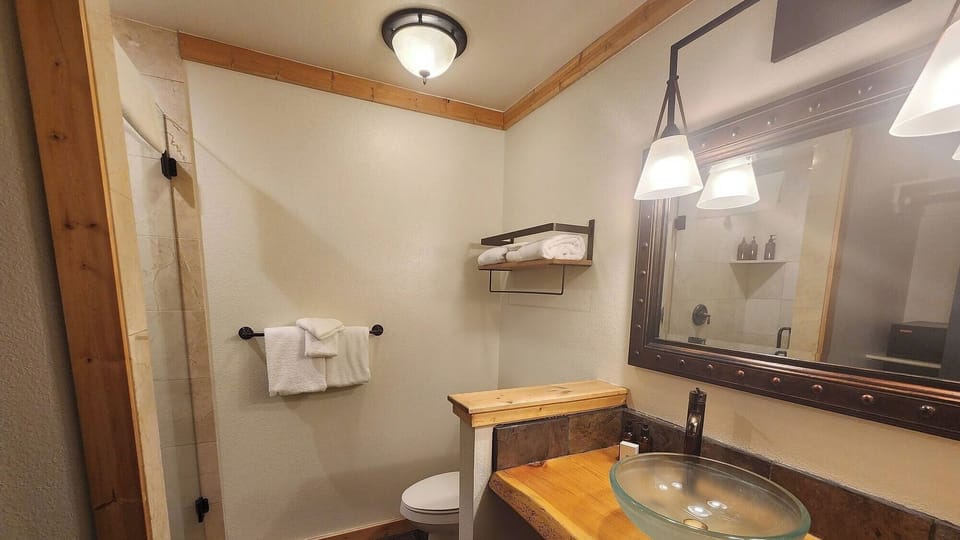 Refresh easily with a roomy vanity and bright mirror lighting.