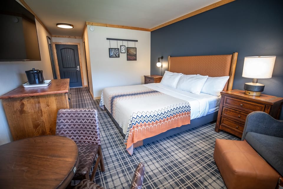 Unwind in a cozy king bed with in-room coffee.