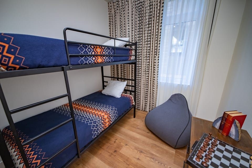 Tuck the kids into cozy bunks after a full day.