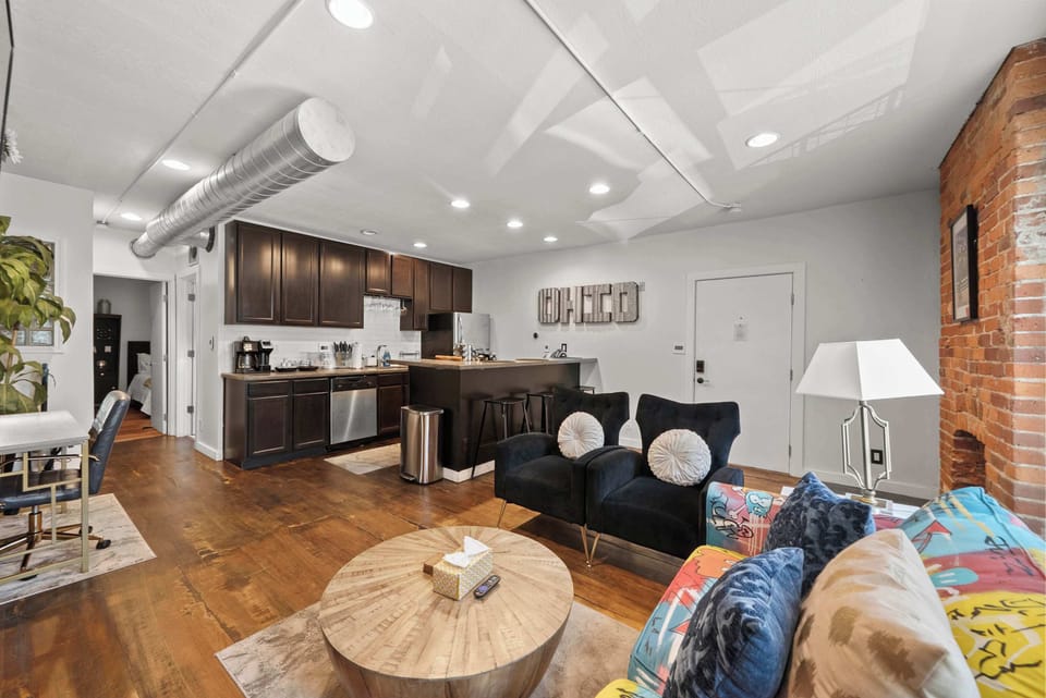 Curl up in the chic living room & stream your favorites on the smart TV​