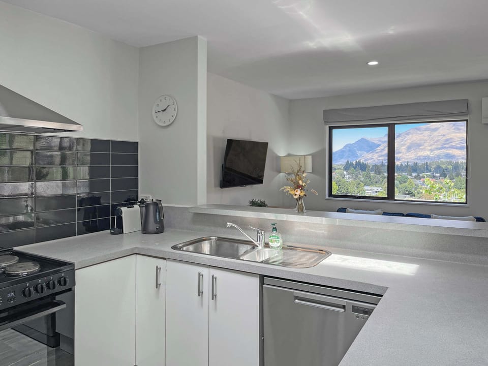 Bright, modern kitchen overlooking the mountains
