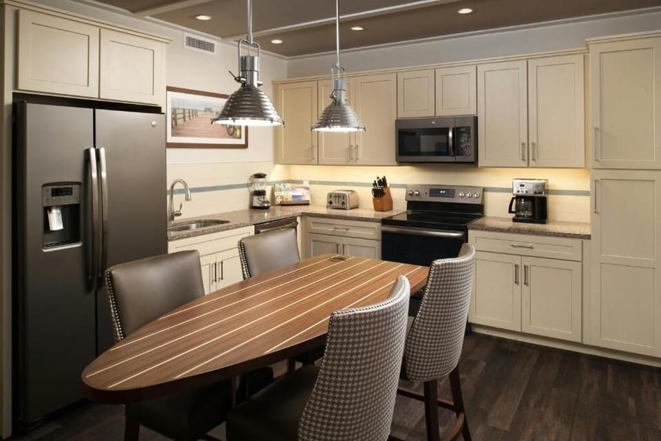 Cook with ease in a bright kitchen with dining table.