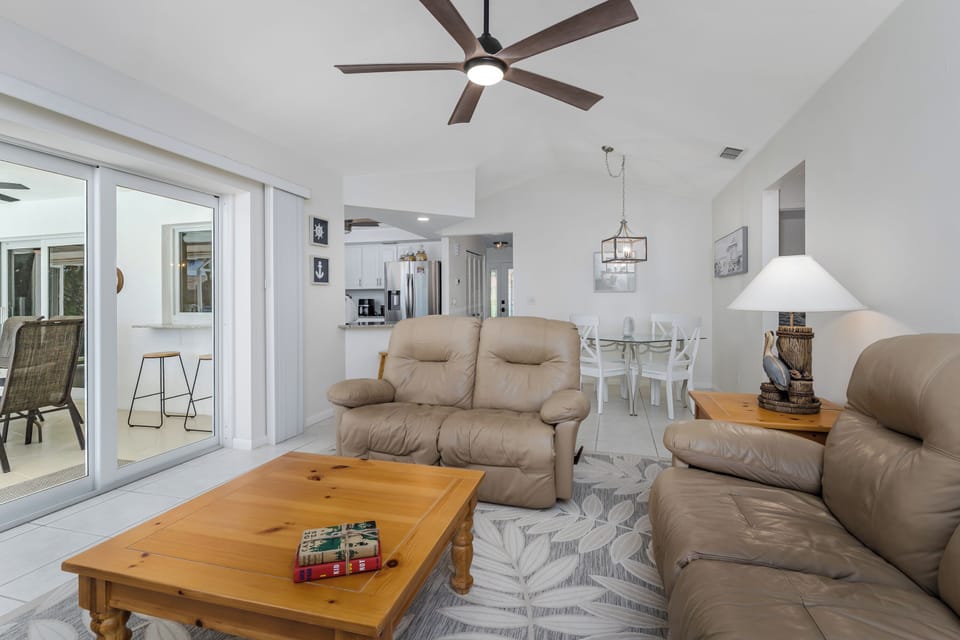 Family Room Leather Loveseat and Lanai Slider Access