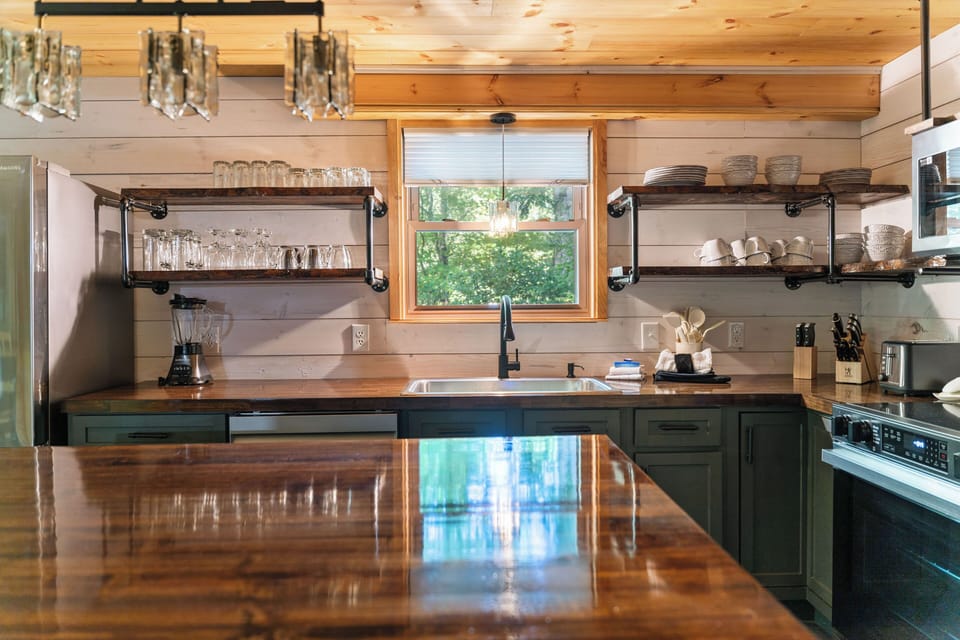Fully stocked kitchen with stainless steel appliances. A home chefs dream!