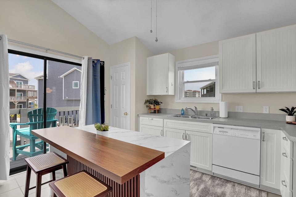 See the ocean from the kitchen sink or the ocean and sound from the back balcony