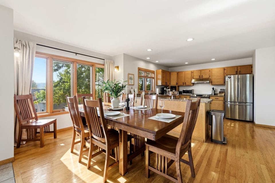 Scenic Dining Area | Large Windows & Natural Light | Seating for 10 | Deck Access