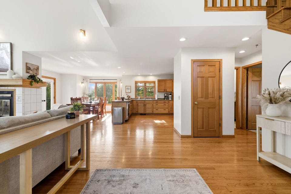 Welcoming Entryway & Living Room | Natural Light | Stylish Décor | Staircase Charm