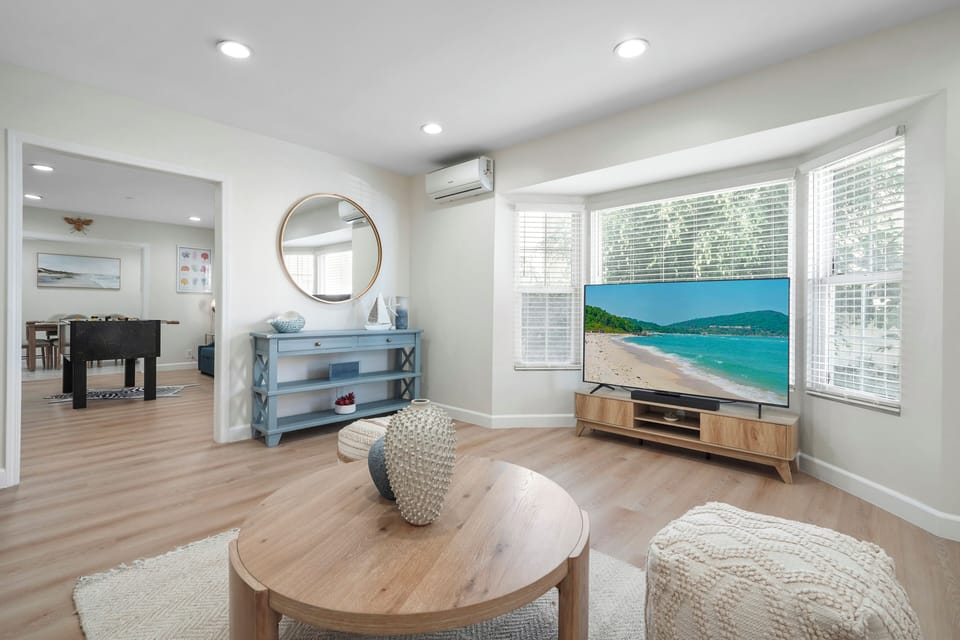 gather w/ friends and family around the chic wooden coffee table for games