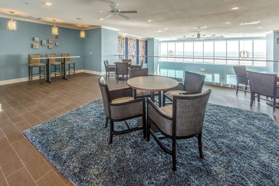 Unwind with ocean breezes in the airy lounge seating.
