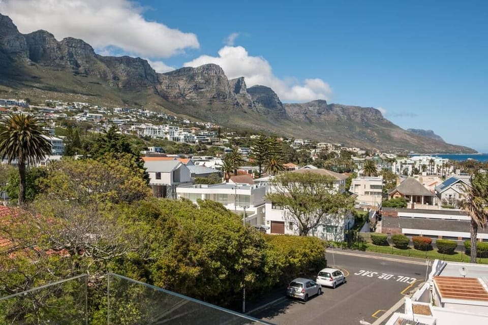 Cul de sac meaning dead end road. Quiet road around the corner of Camps Bay beach
