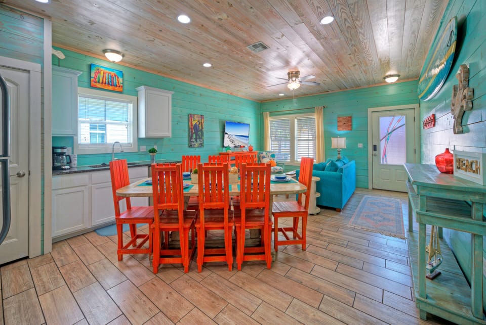 Share meals at the coastal dining table that seats eight.