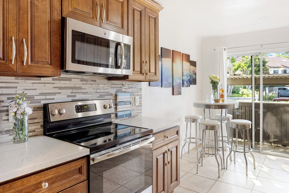 Kitchen with stainless steel appliances.
