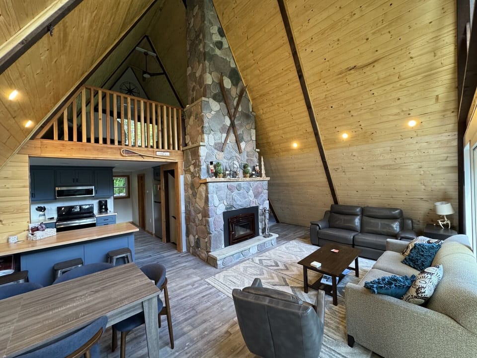 Upstairs living room with wood burning stove