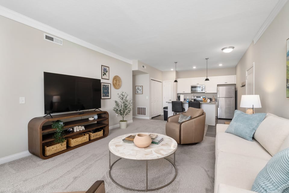 Lots of comfortable seating and 55" TV with DirecTV included! 