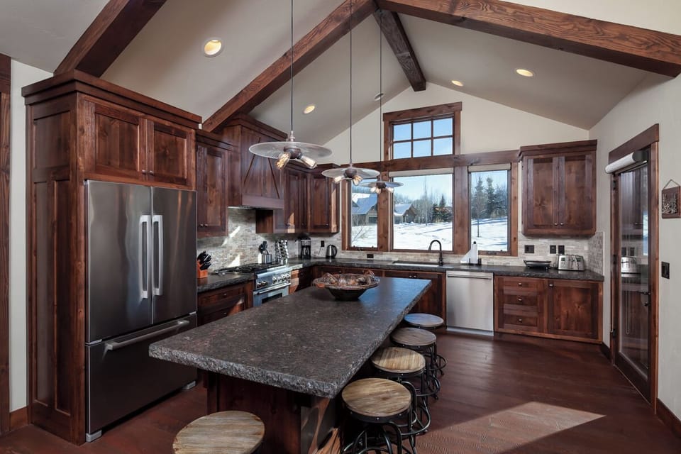 Cook and connect in the gourmet kitchen with oversized island seating.