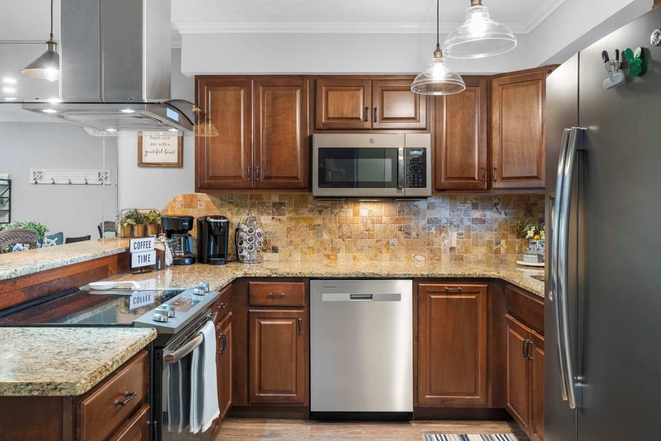 The inviting kitchen offers ample space & all the comforts of home​
