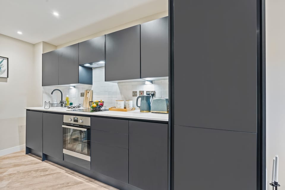 The sleek modern kitchen is fully equipped for you to prepare and cook meals during your stay. There is a kettle, toaster, full size dishwasher and oven with electric hob so you will feel right at home.
