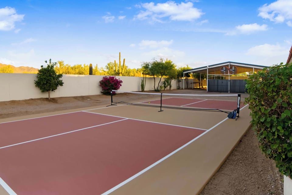 Engage in vibrant play, encircled by boundless desert scenery.