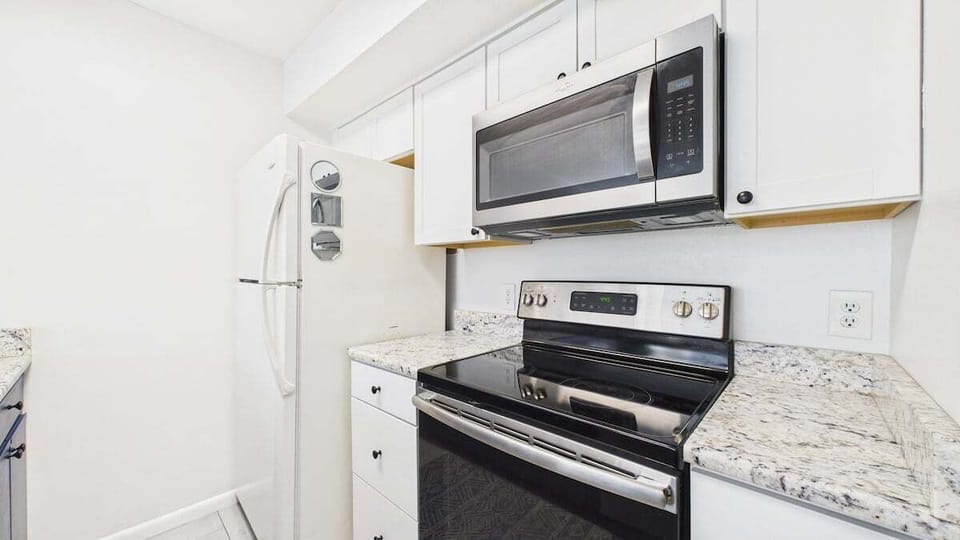 Full kitchen with stainless appliances