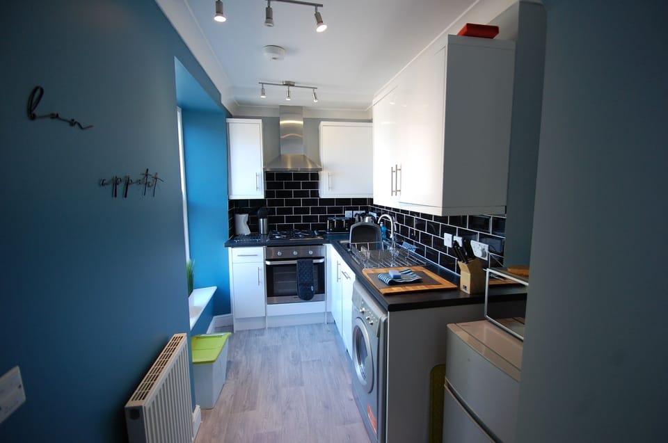 Watson Kitchen with dishwasher and washing machine