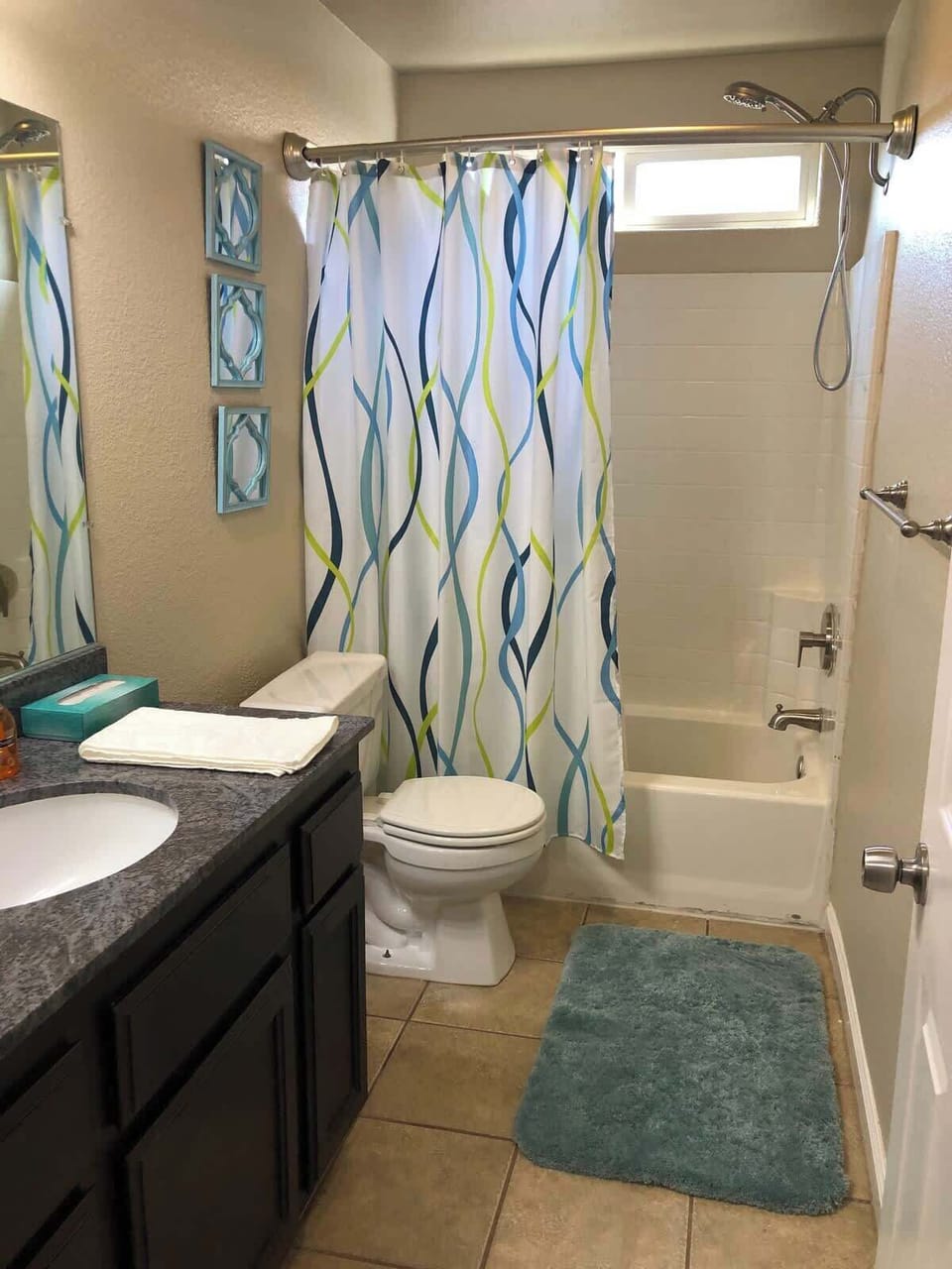 Upstairs primary bathroom.

Towels are stored in upstairs hall linen closet