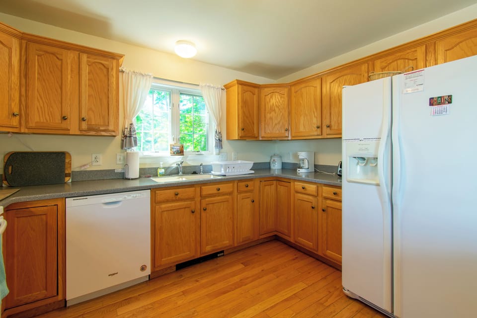 Large refrigerator, water and ice dispenser.
