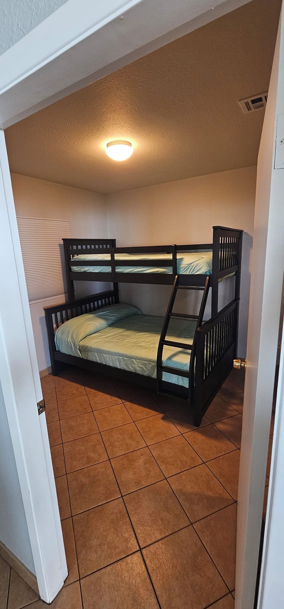 2nd bedroom with bunk beds top single bed bottom double bed 