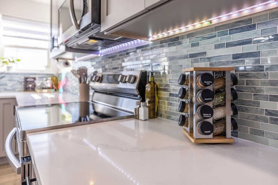 Seasoned to perfection, this countertop invites you to create something delicious. With spices within reach, utensils at hand, and plenty of space to cook, every meal feels like a joyful experience.