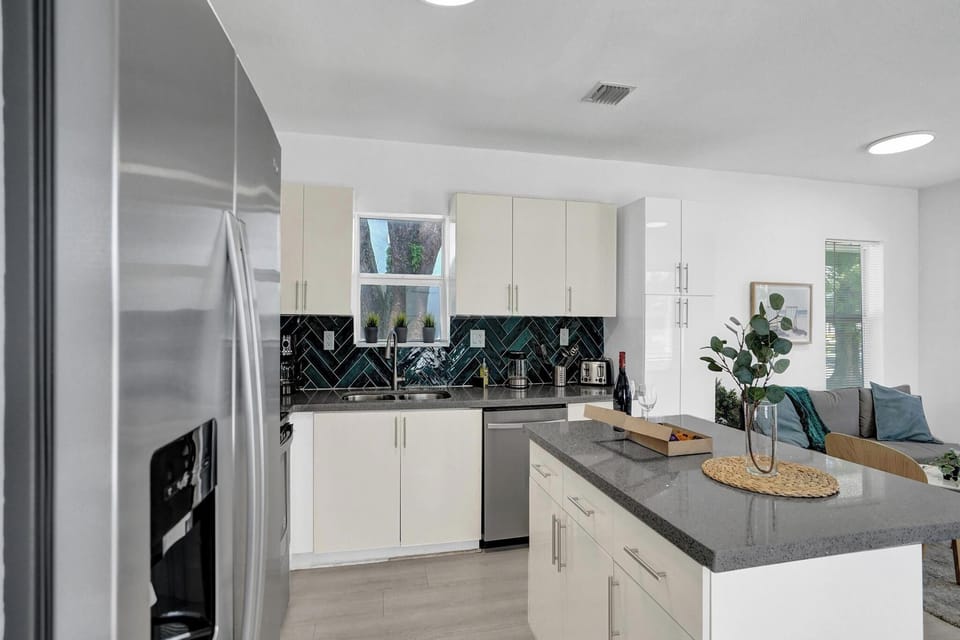 Kitchen: Whip up culinary delights in this stylish space with chic decor and modern appliances!