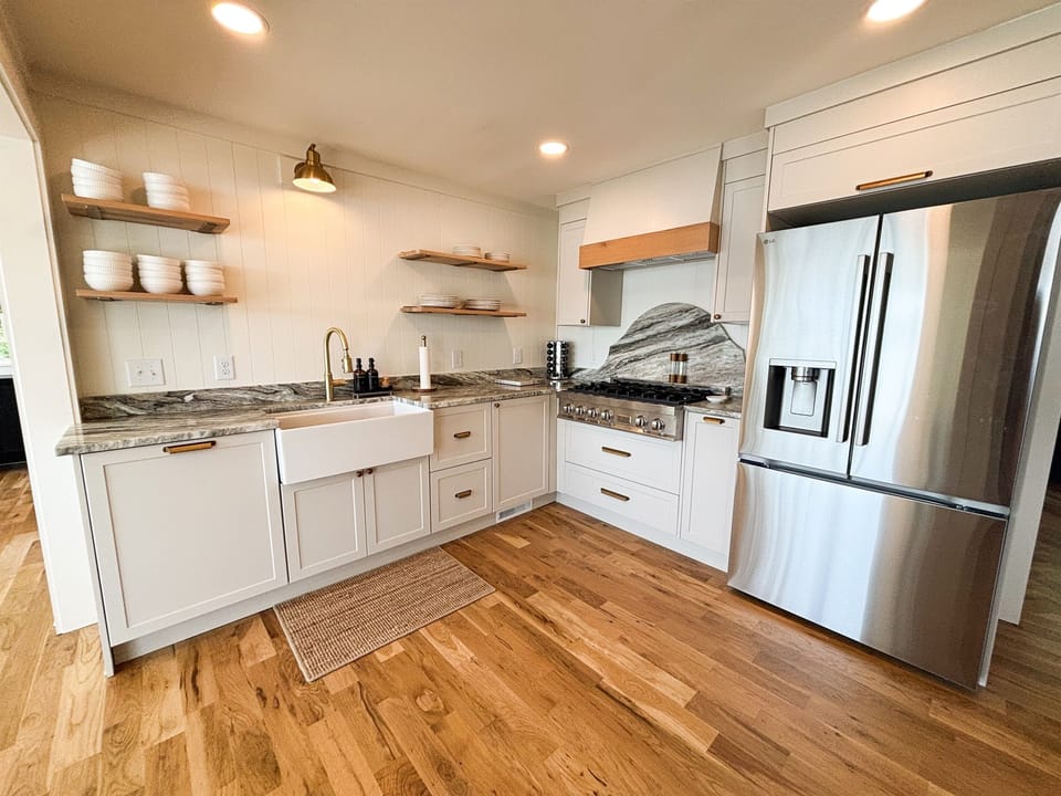 Dishwasher, 6 burner cook top, french door fridge and stocked kitchen cookware