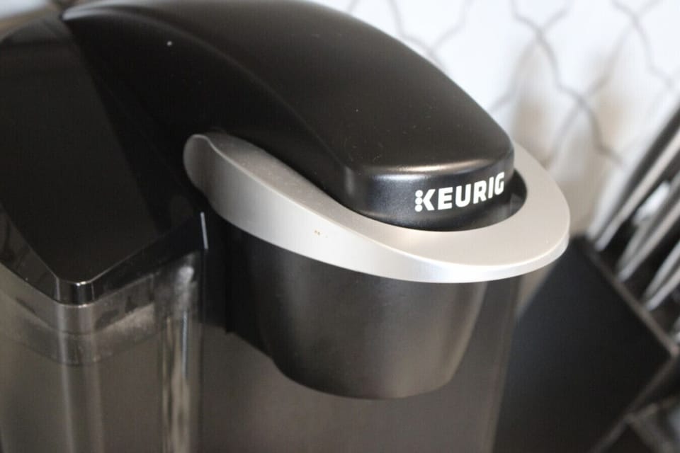 Coffee Corner: Brew your favorite blends effortlessly with our premium Keurig coffee maker.
